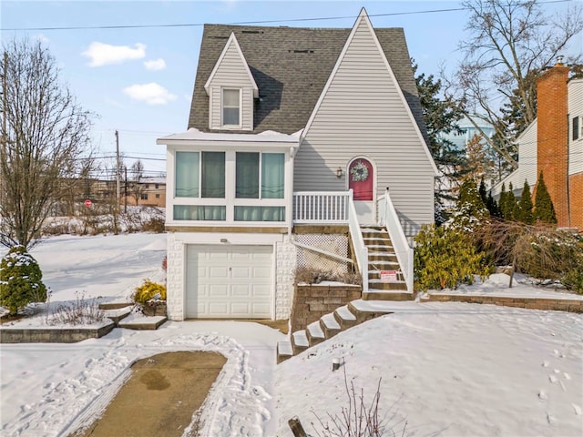 view of front of property featuring a garage