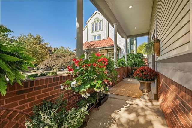 view of property exterior featuring a porch