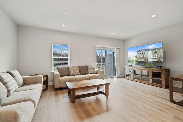 living room with light hardwood / wood-style floors