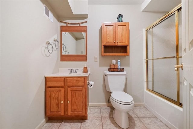 full bathroom featuring combined bath / shower with glass door, vanity, toilet, and tile patterned flooring