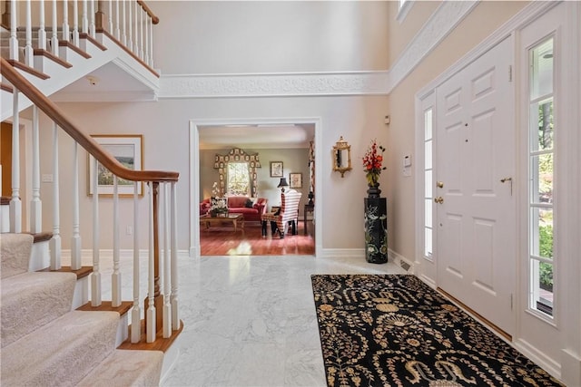 entrance foyer with ornamental molding