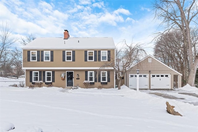 colonial inspired home with a garage