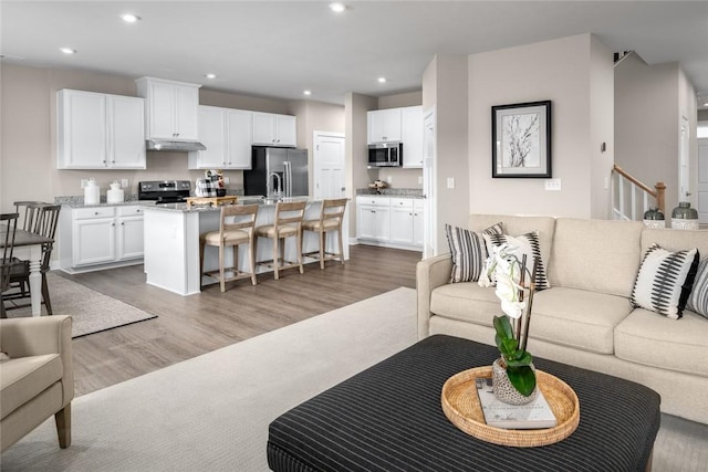 living room featuring light hardwood / wood-style flooring