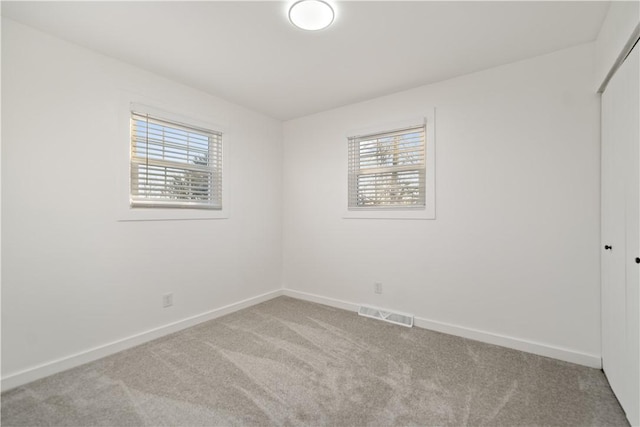 view of carpeted spare room