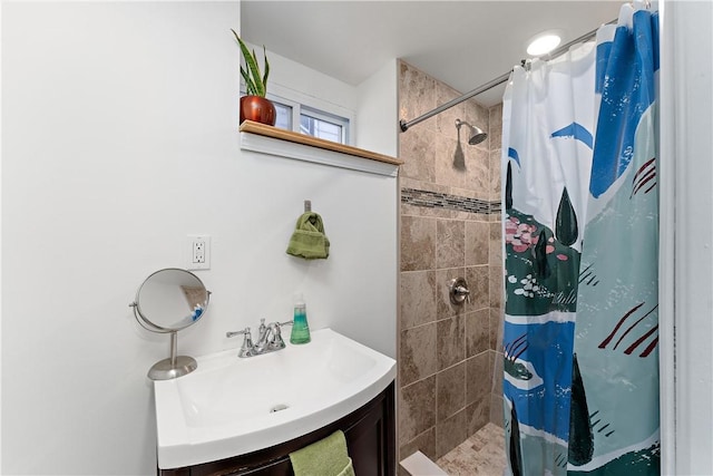 bathroom featuring vanity and walk in shower