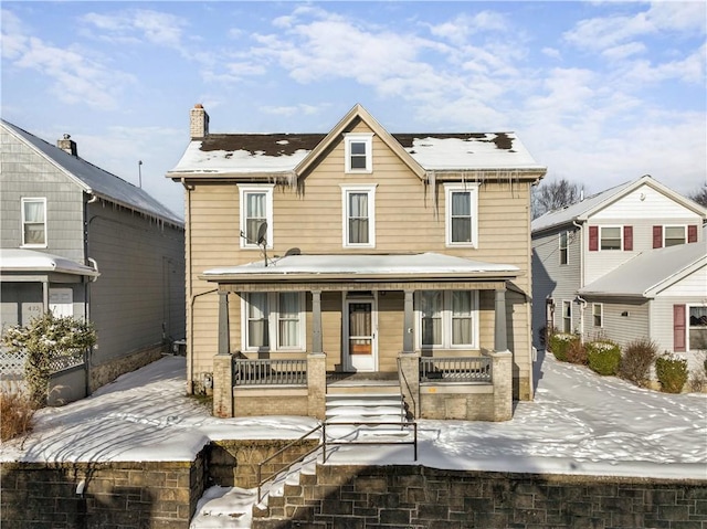 front of property featuring a porch