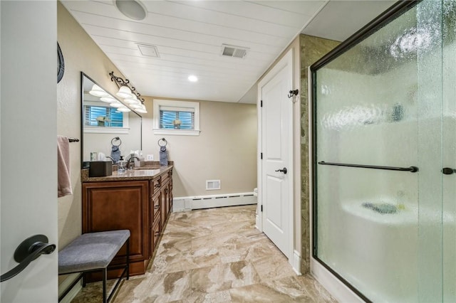 bathroom with walk in shower, a baseboard heating unit, and vanity