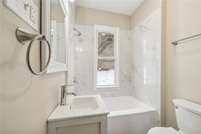 full bathroom with vanity, toilet, and shower / tub combination