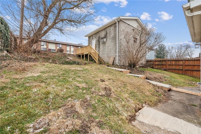 view of yard with a wooden deck