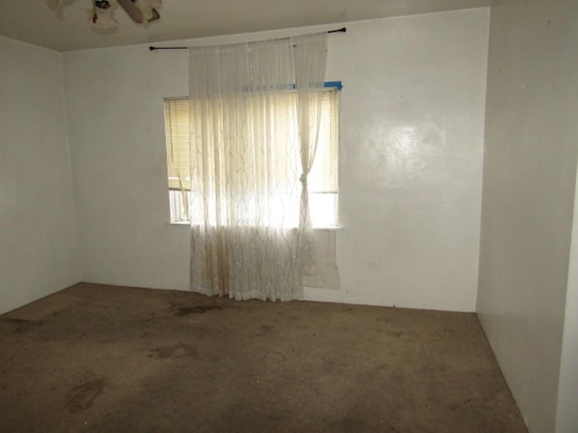 empty room with carpet flooring