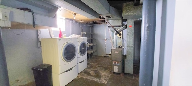 laundry room with washer and dryer