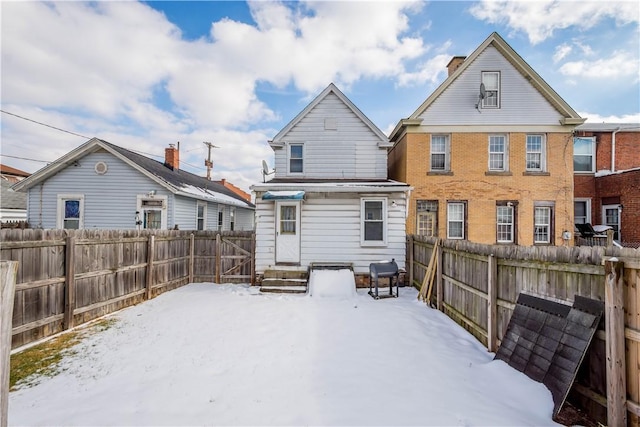 view of snow covered house