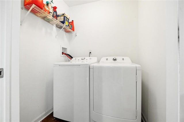 washroom featuring independent washer and dryer