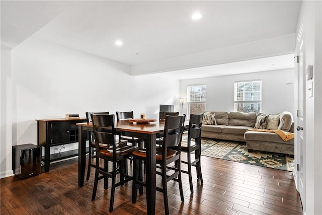 dining room featuring dark hardwood / wood-style flooring