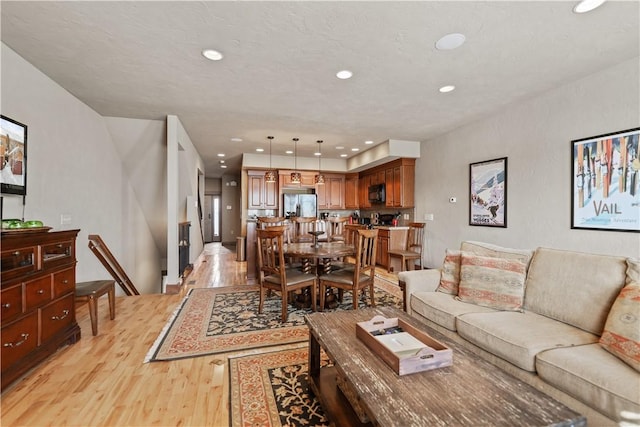 living room with light hardwood / wood-style floors