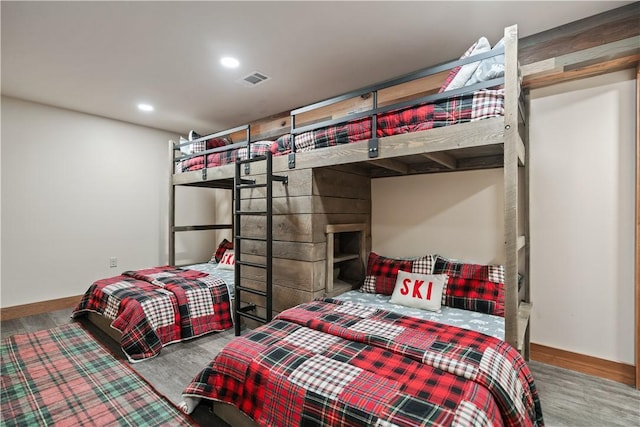 bedroom featuring hardwood / wood-style floors