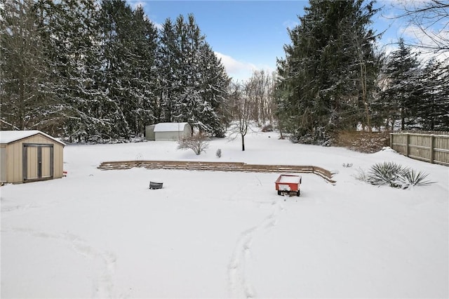 view of yard layered in snow