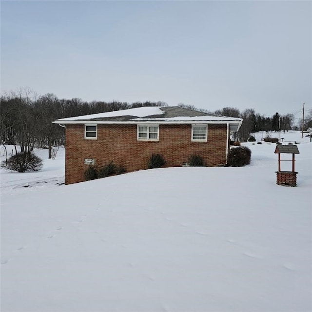 view of snow covered property