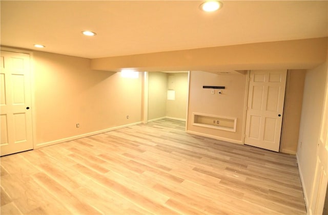 409 Himler Rd, Hempfield Twp Wml, PA 15601 - finished basement with baseboards, light wood-style floors, and recessed lighting