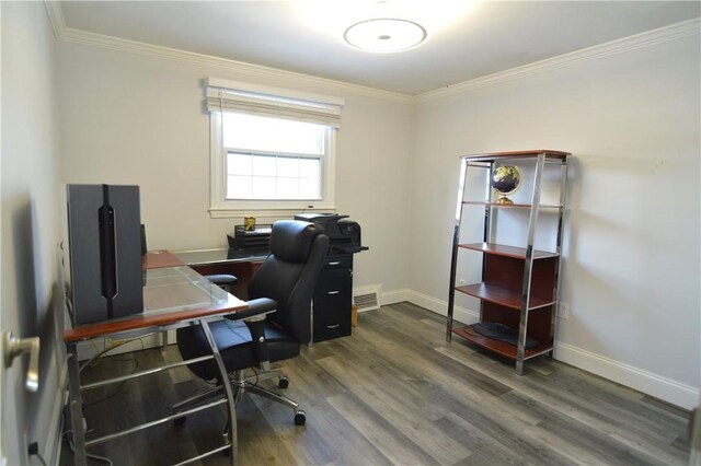 office with ornamental molding and dark hardwood / wood-style floors