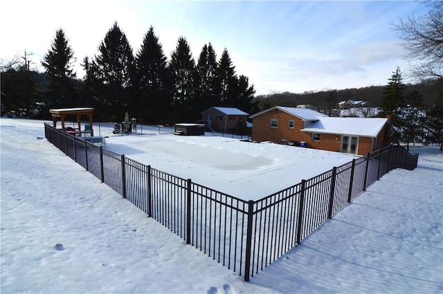 view of yard layered in snow