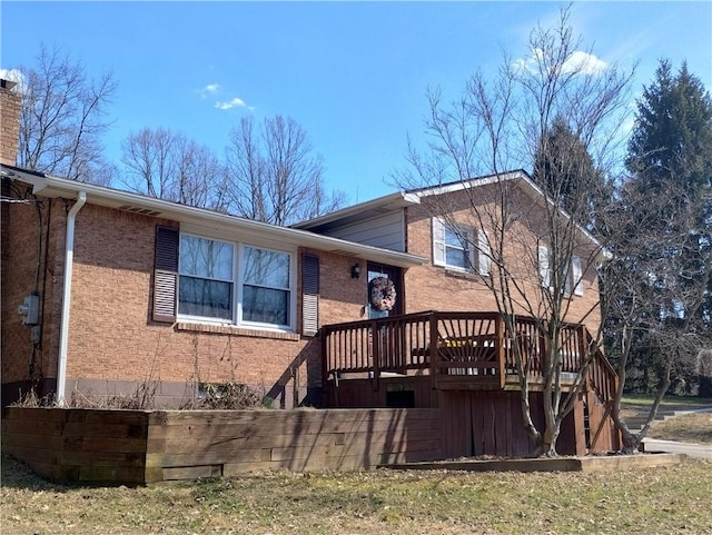 409 Himler Rd, Hempfield Twp Wml, PA 15601 - view of side of property featuring a deck and brick siding