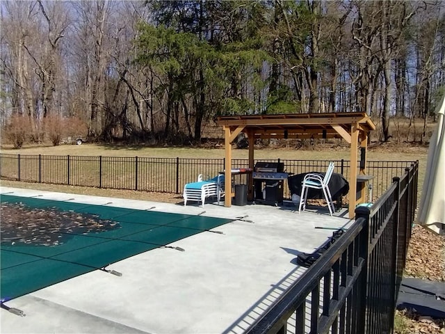 409 Himler Rd, Hempfield Twp Wml, PA 15601 - view of pool with a patio area, area for grilling, and view of wooded area