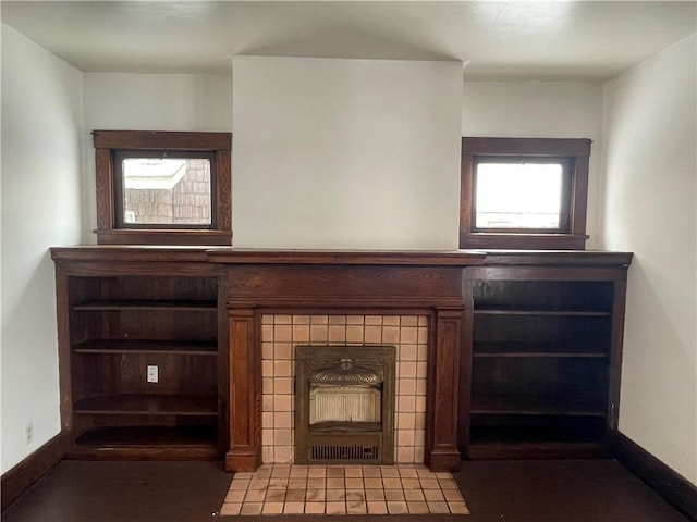 room details featuring a tiled fireplace