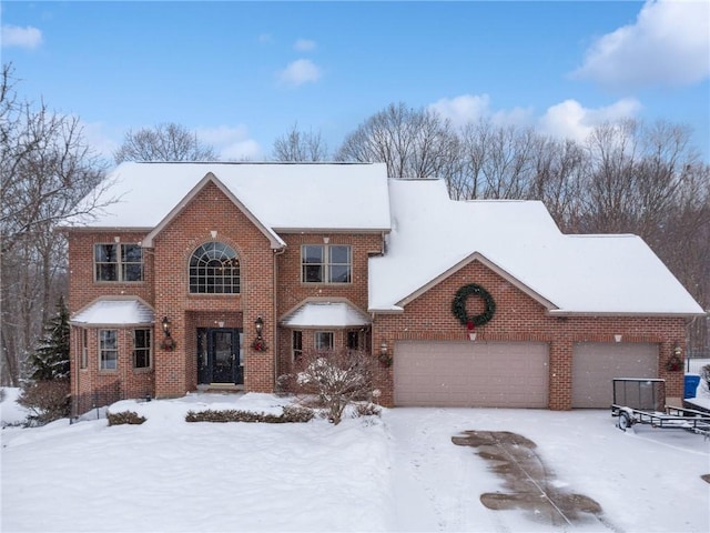 view of front of home with a garage