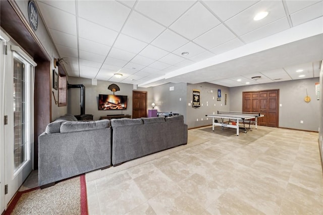 living room featuring a wood stove