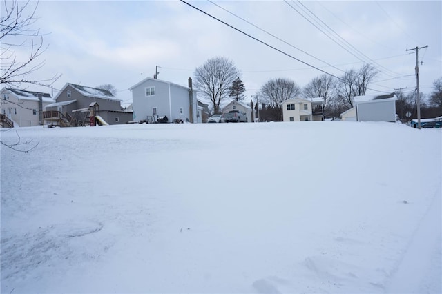 view of yard covered in snow