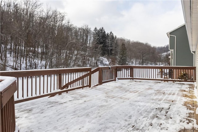 view of snow covered deck