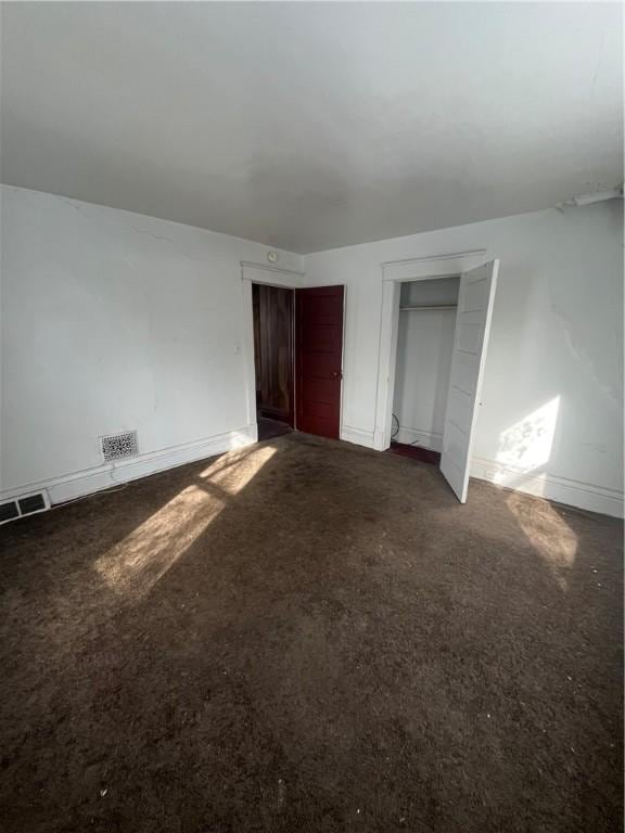 unfurnished bedroom featuring a closet