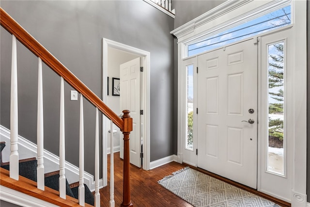 foyer featuring dark hardwood / wood-style floors