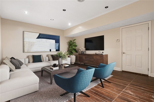 living room featuring dark hardwood / wood-style flooring