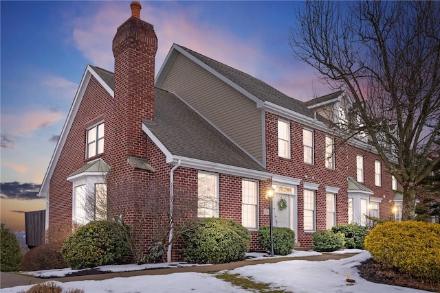 view of snow covered property