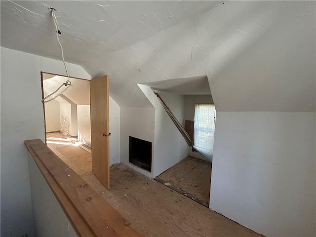 bonus room with vaulted ceiling