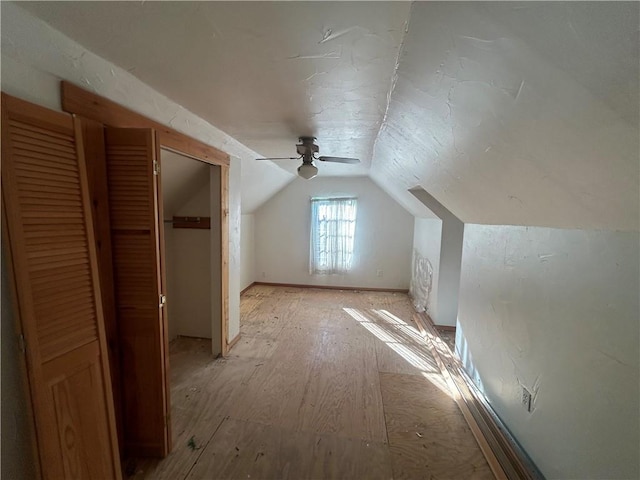 additional living space with vaulted ceiling