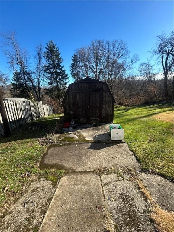 exterior space with a storage shed