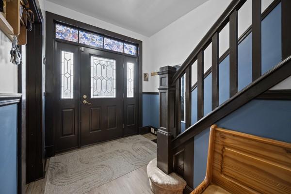 foyer with light wood-type flooring