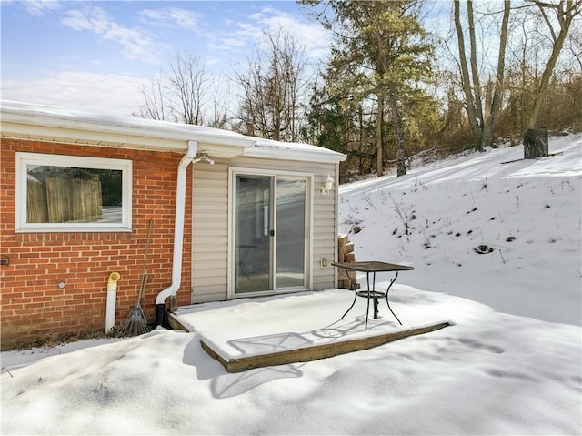 view of snow covered property