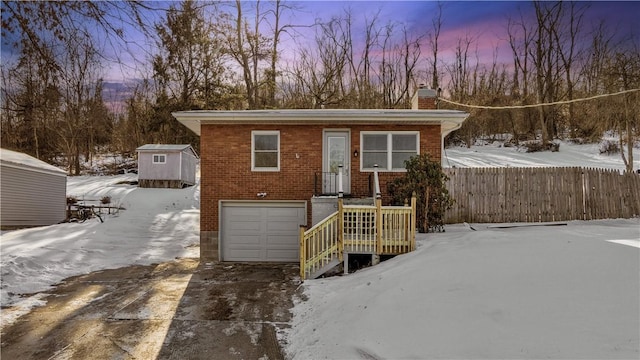 view of front of property featuring a garage