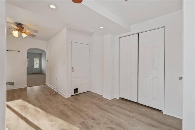 interior space with ceiling fan and light wood-type flooring