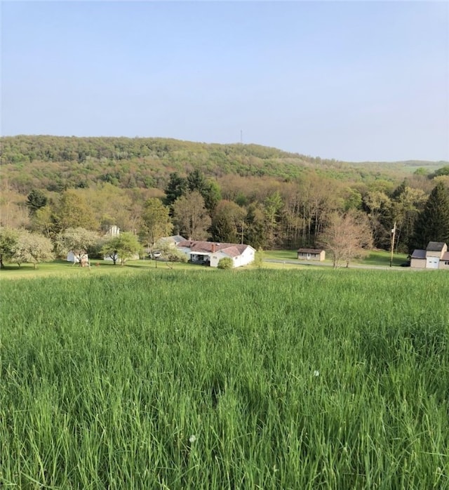 exterior space with a rural view