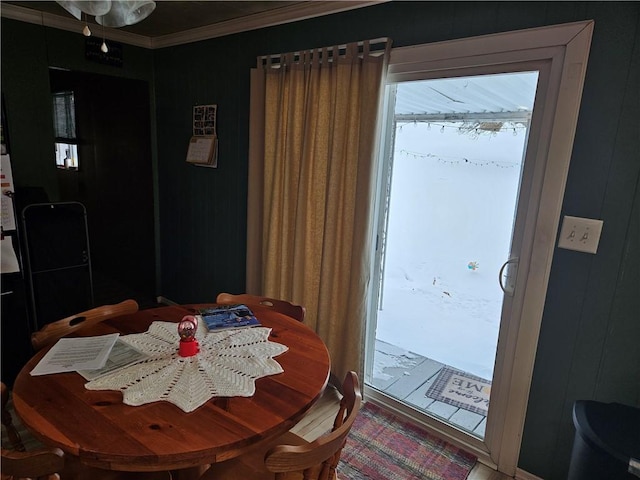 dining room featuring ornamental molding