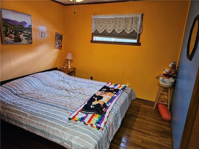 bedroom featuring dark wood-type flooring