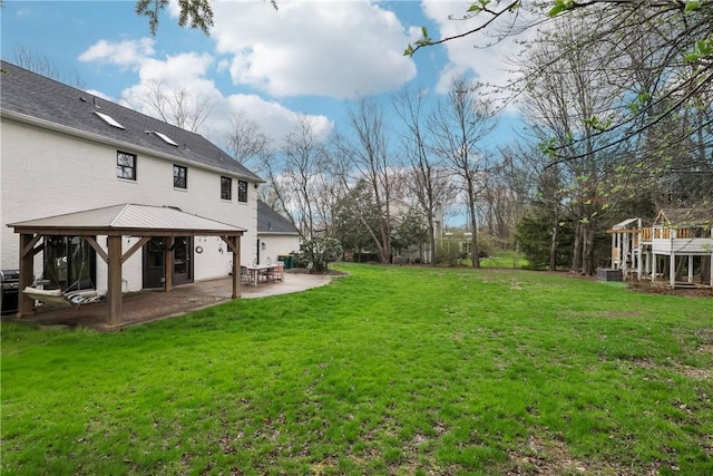 view of yard with a patio area and a gazebo