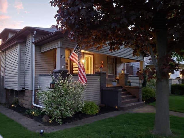 view of front of home featuring covered porch