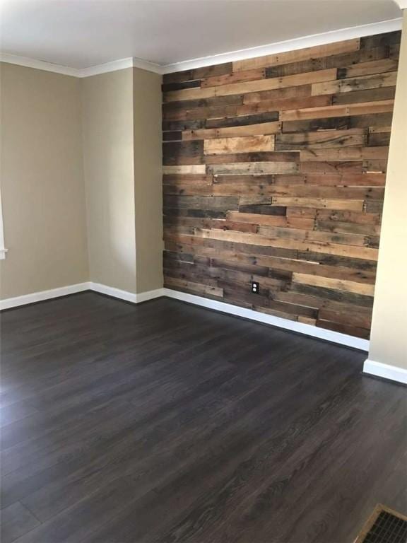 448 Baldwin Ave, Sharon, PA 16146 - unfurnished room with baseboards, dark wood-style floors, and ornamental molding
