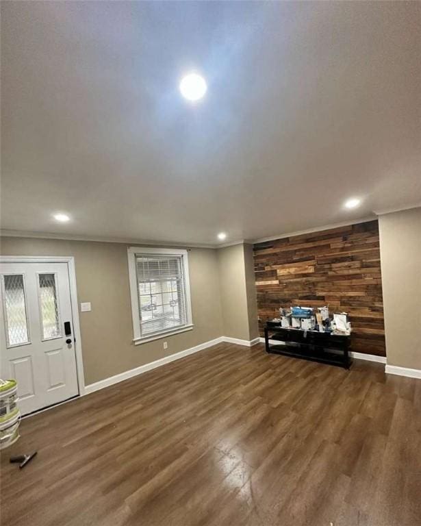 448 Baldwin Ave, Sharon, PA 16146 - living area with wooden walls, recessed lighting, baseboards, wood finished floors, and crown molding